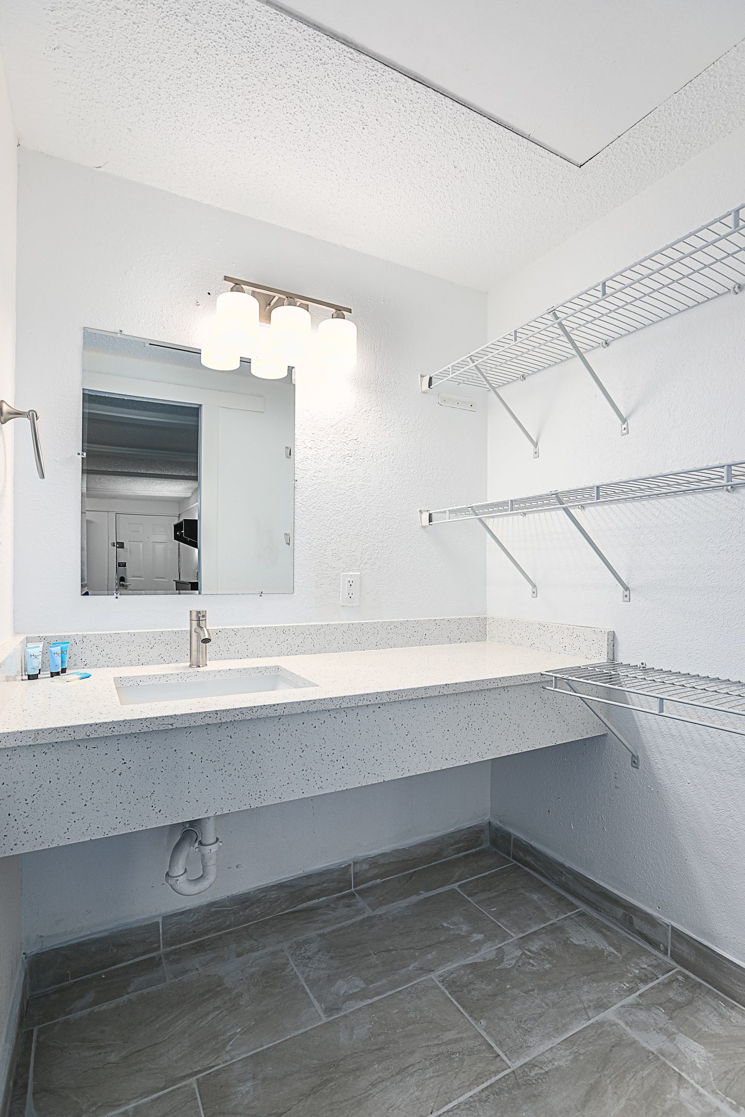 Vanity with mirror and open shelving